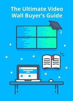 The Ultimate Video Wall Buyer's Guide, un graphique de mur vidéo avec une casquette de diplômé, un bureau avec un ordinateur portable, une souris et un livre.