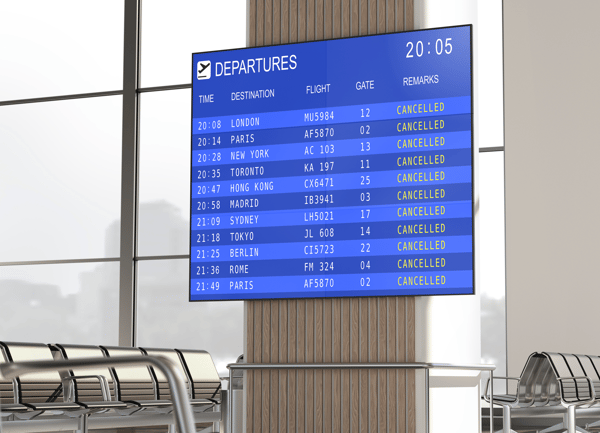 Tableau FID montrant les vols sur des écrans dans l'aéroport